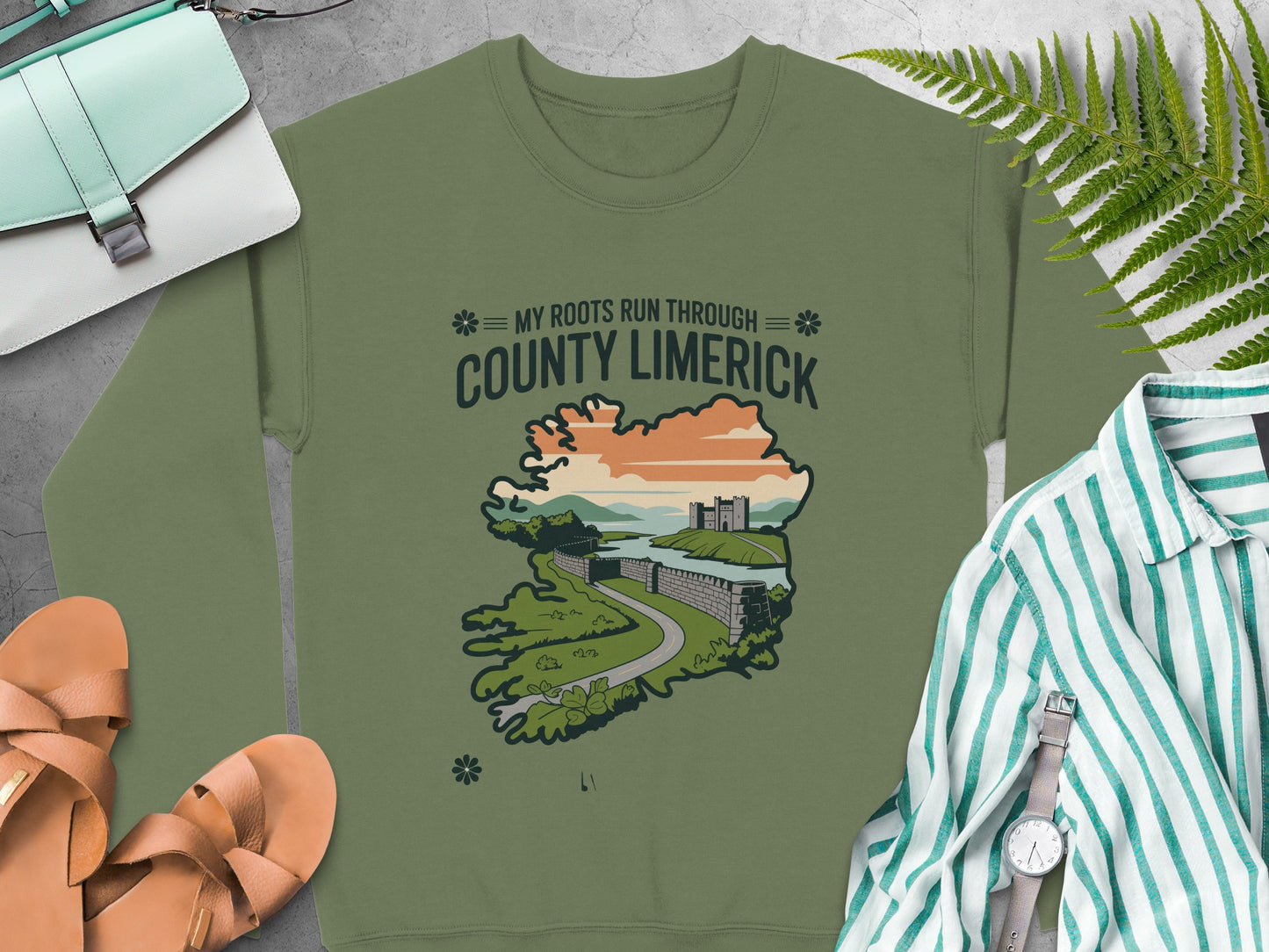"County Limerick" map graphic, surrounded by accessories on Military Green sweatshirt
