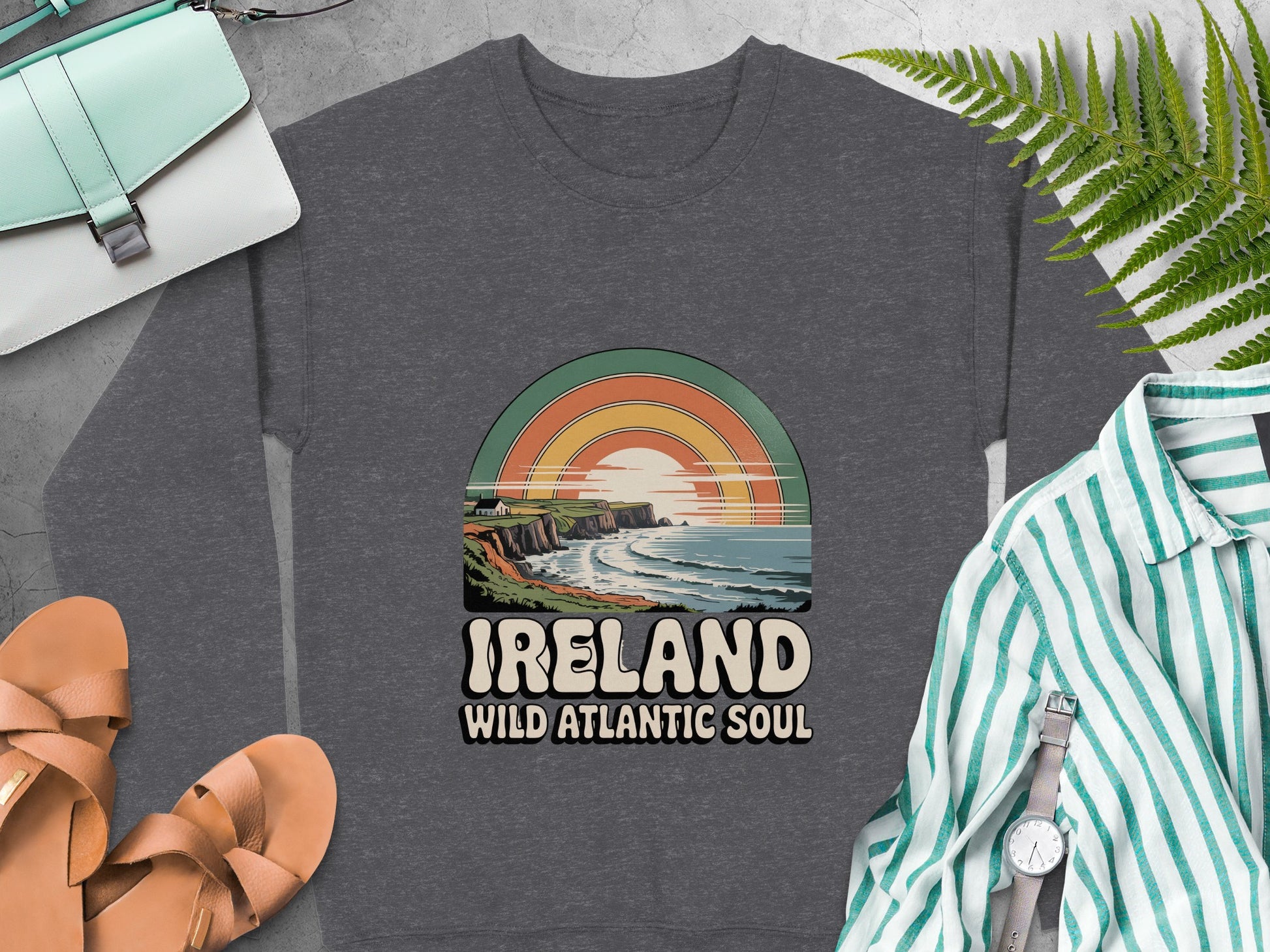 Ireland Wild Atlantic Soul graphic and coastal sunset scene on Dark Heather sweatshirt