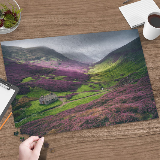 Puzzle of a stone cottage nestled in a valley of purple heather.