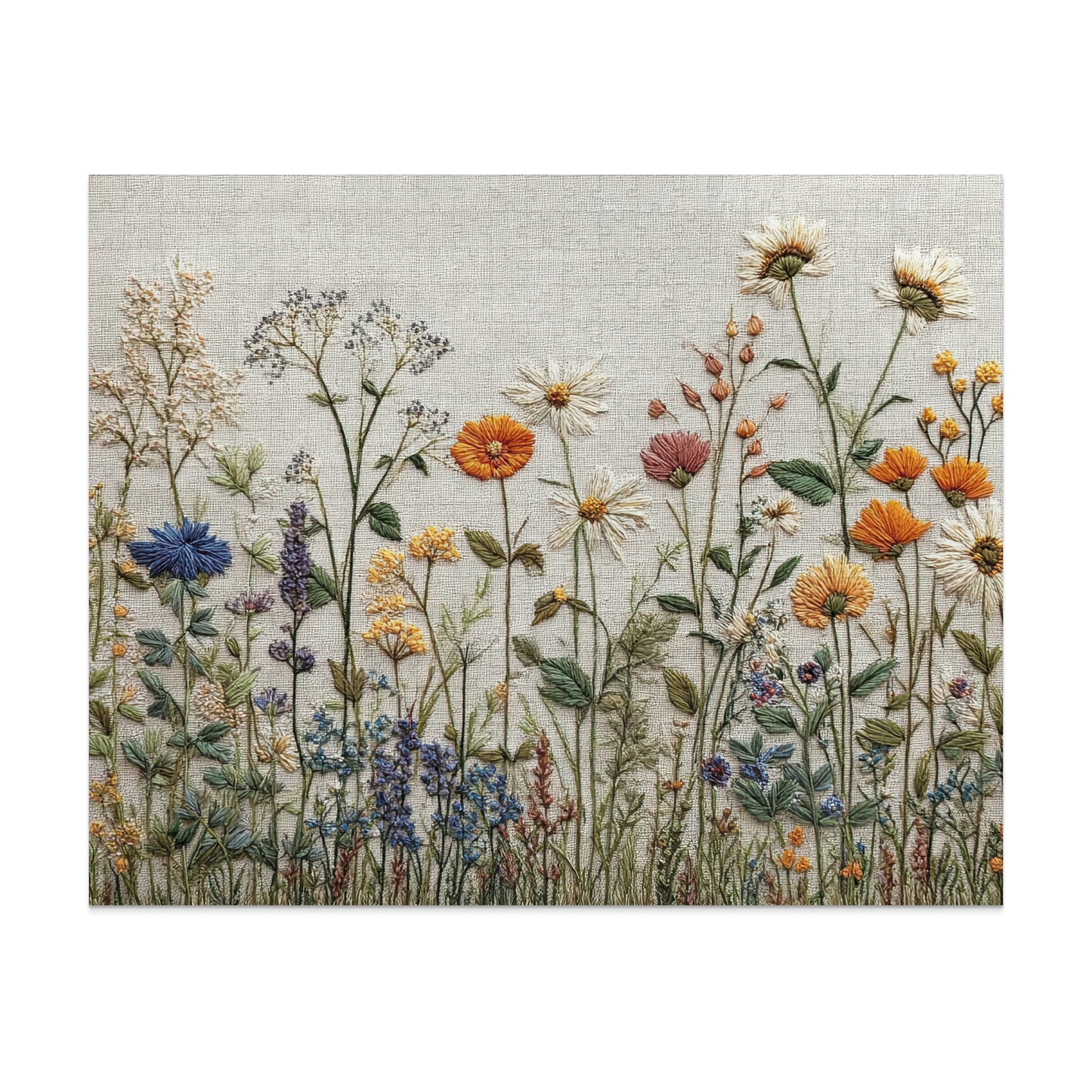 Embroidery of wildflowers with various colors and textures on a light fabric background.