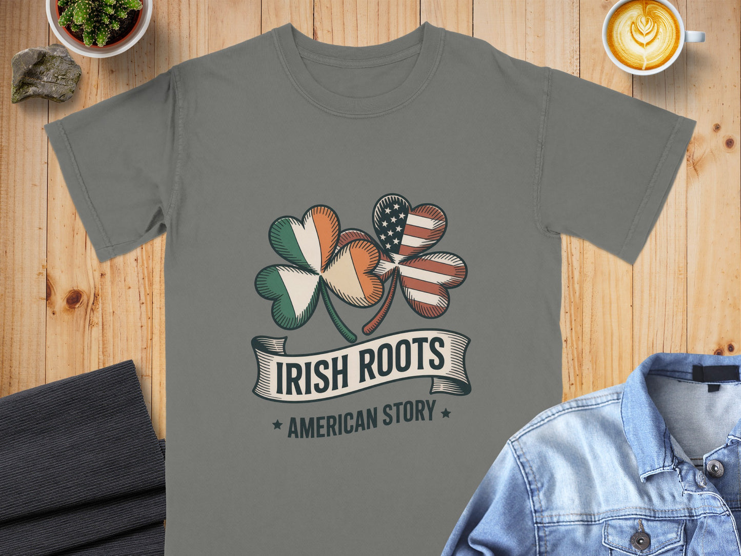 Gray t-shirt with Irish and American flag shamrock graphic, "IRISH ROOTS AMERICAN STORY" text.
