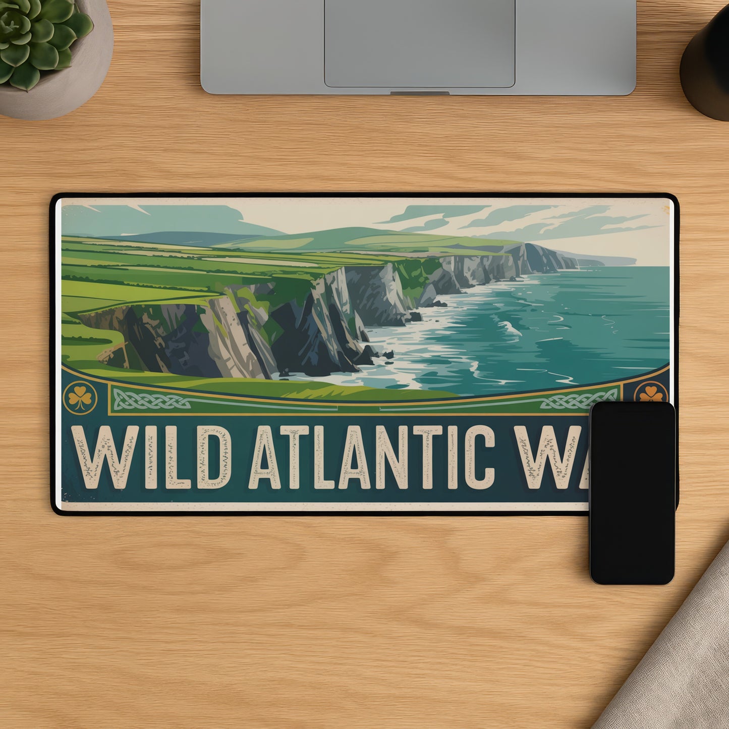 Wild Atlantic Way poster featuring coastal cliffs and ocean waves with text.
