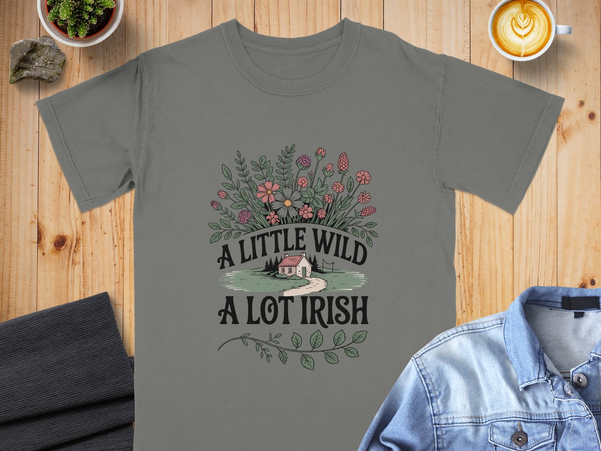 Gray t-shirt with "A little wild, a lot Irish" text and floral design.