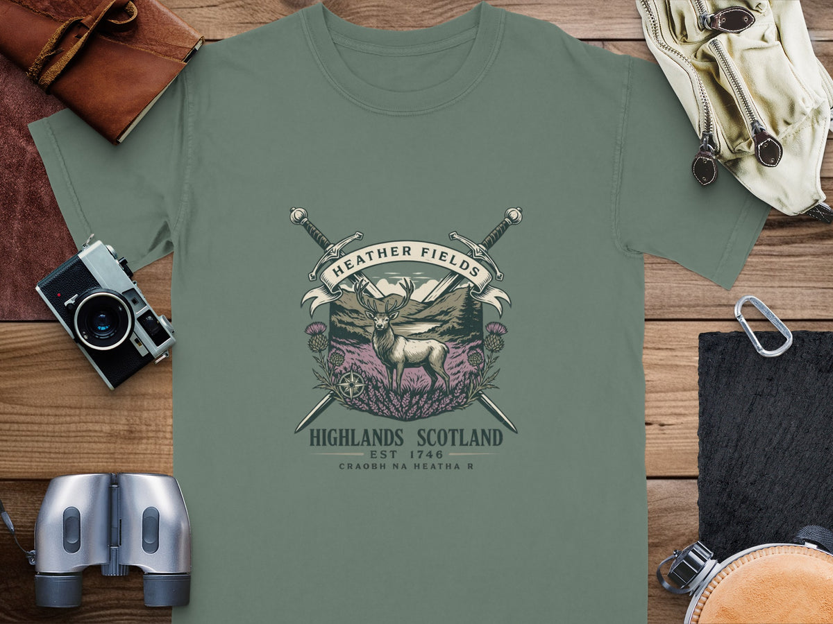 Green t-shirt with "Heather Fields Highlands Scotland Est 1746" graphic and deer.