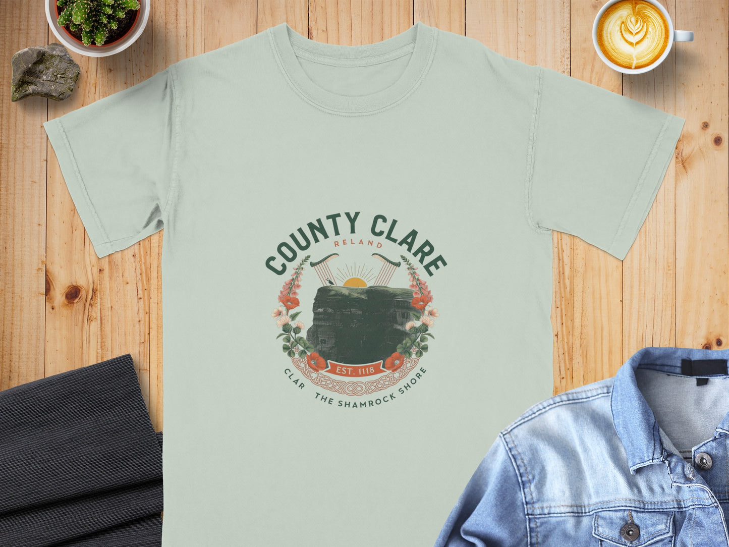 Light green t-shirt with County Clare Ireland graphic featuring Cliffs of Moher and shamrocks.