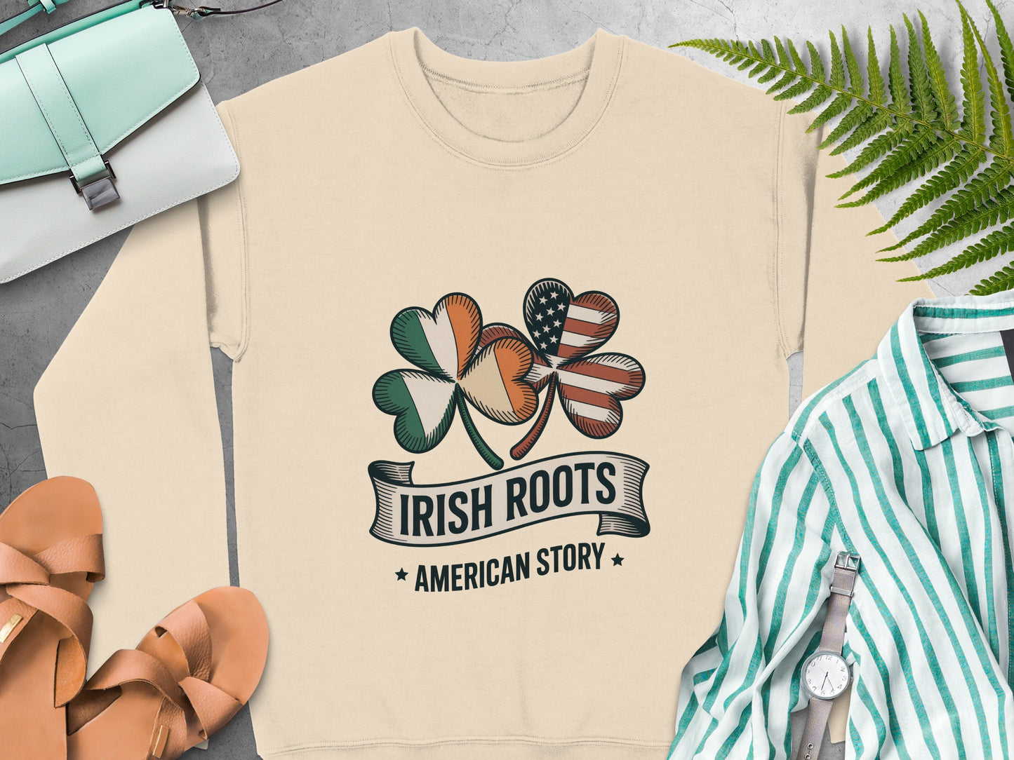 Shamrock graphic and "Irish Roots American Story" text on Sand sweatshirt
