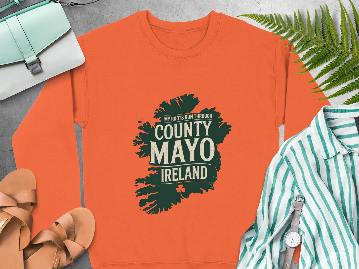 Orange sweatshirt with "County Mayo Ireland" text and a map outline.