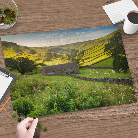 Stone barn and sheep in a pastoral landscape with wildflowers and a patchwork field.