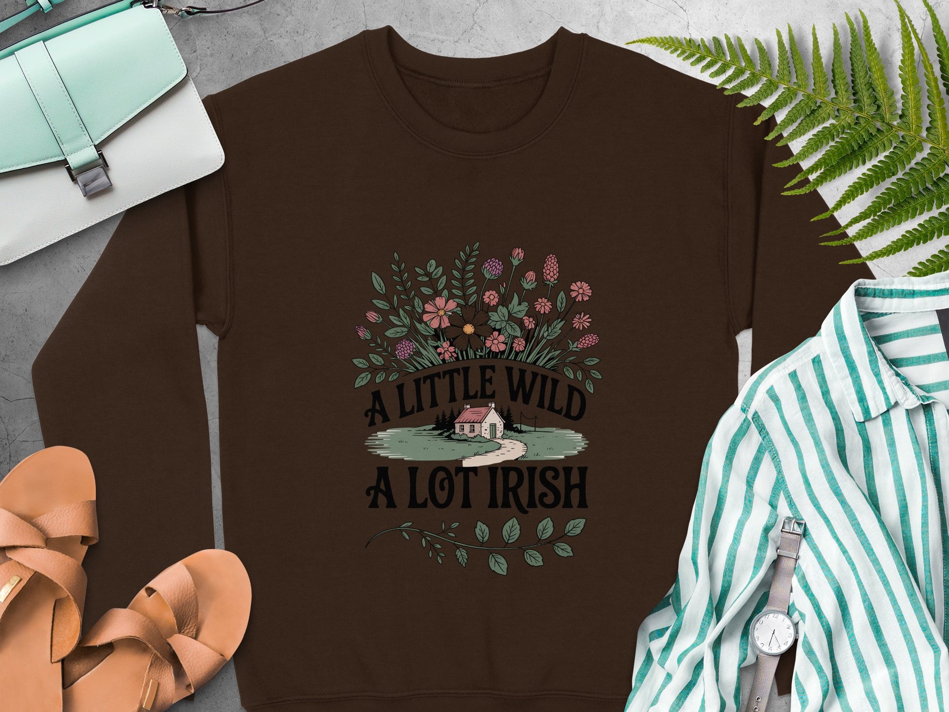 "A Little Wild A Lot Irish" text and floral design on Dark Chocolate sweatshirt