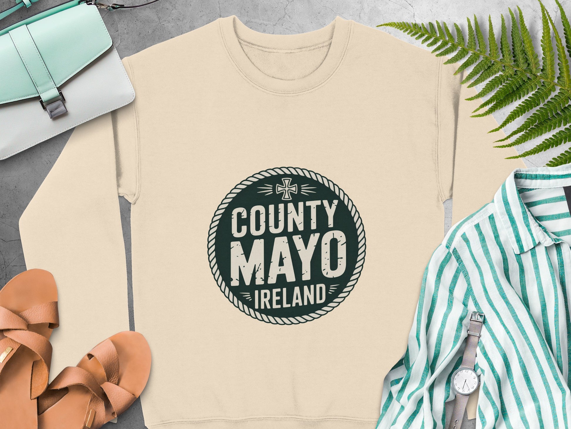 Dark green "County Mayo Ireland" graphic in a circle on Sand sweatshirt