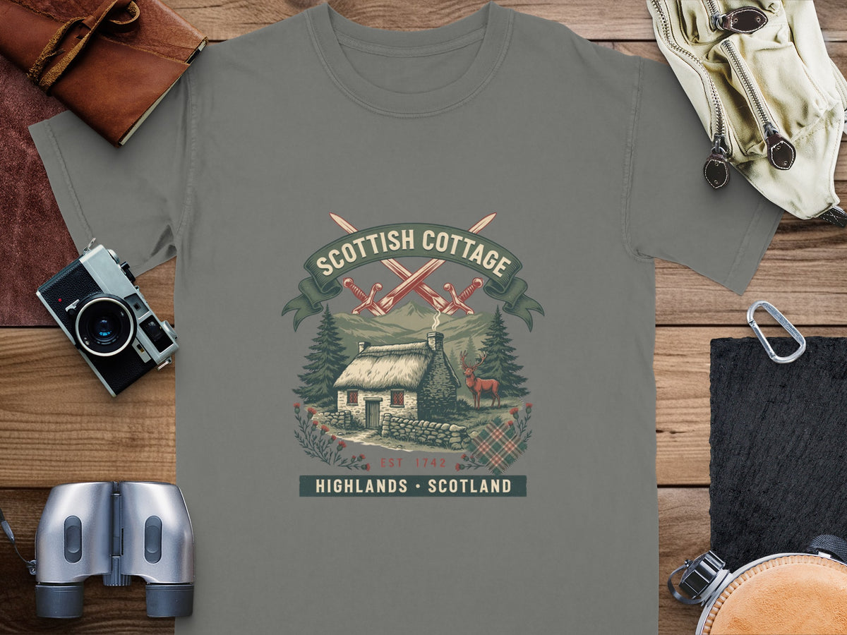 Scottish Cottage graphic with swords, deer, and text "EST 1742".