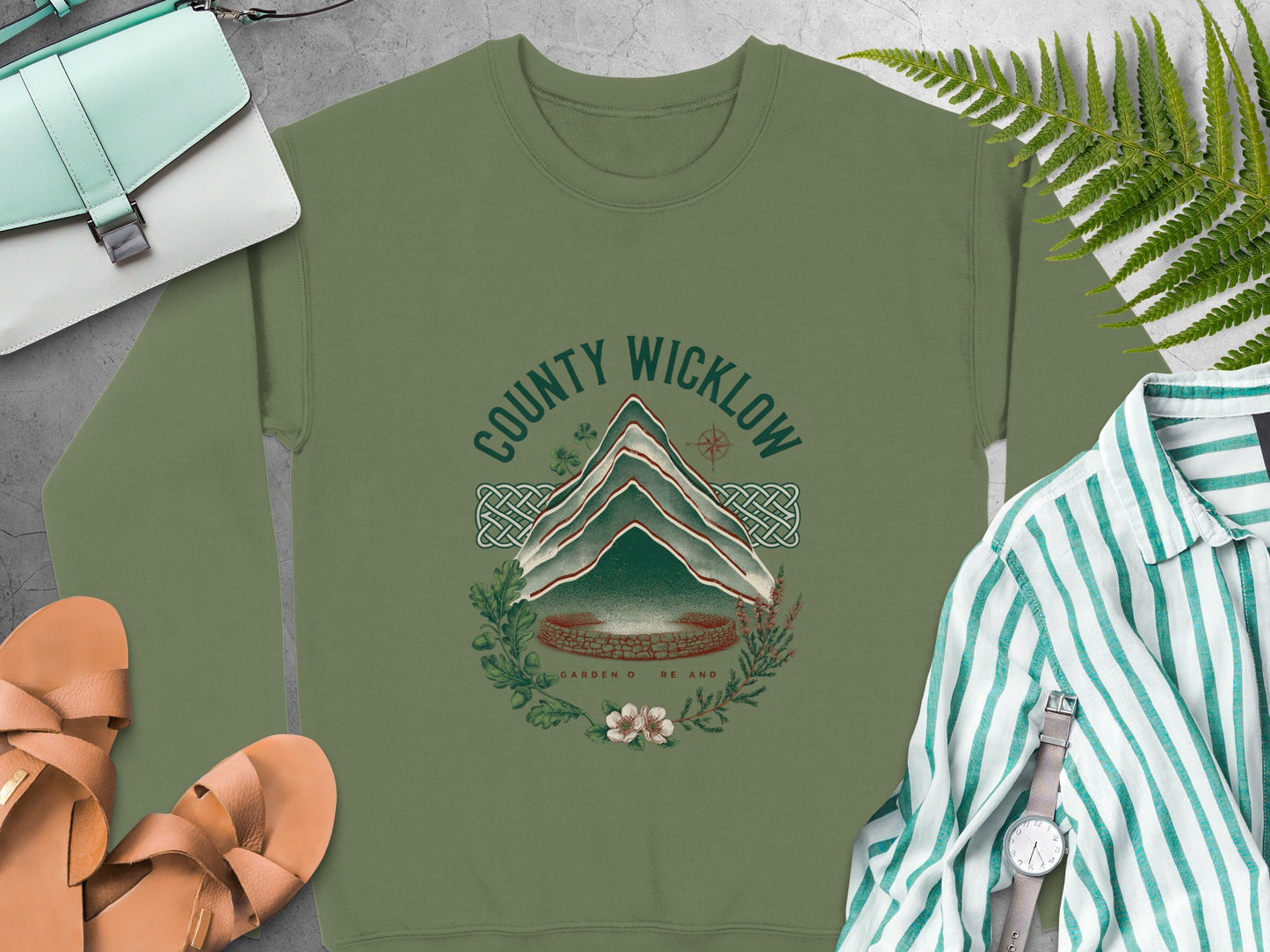 Olive green sweatshirt with "County Wicklow Garden of Ireland" text and mountain graphic.