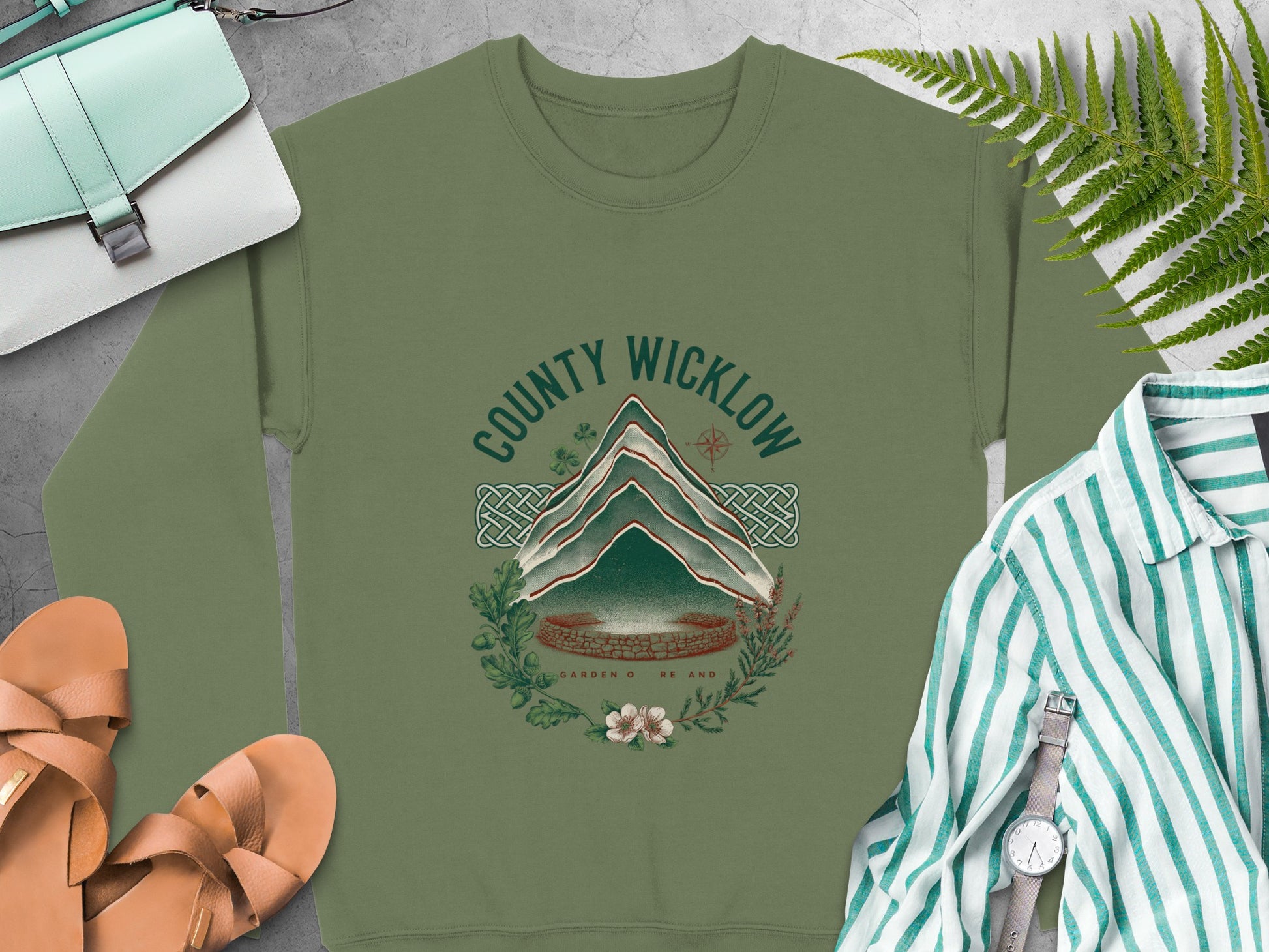 Olive green sweatshirt with "County Wicklow Garden of Ireland" text and mountain graphic.