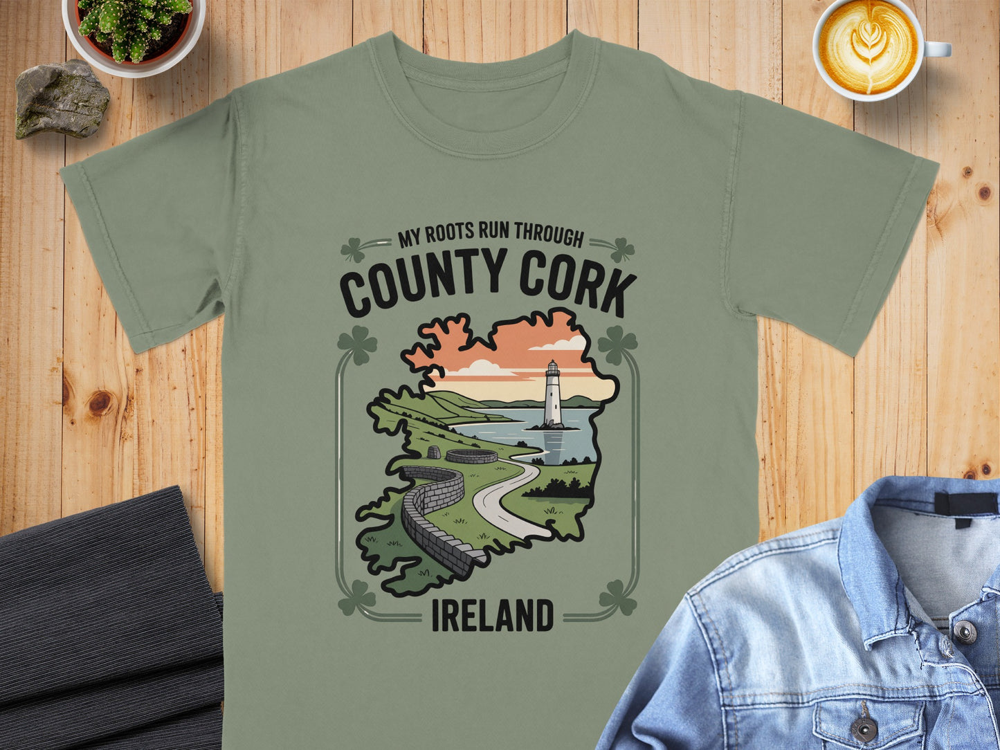 Green t-shirt with "County Cork Ireland" text and a lighthouse landscape graphic.
