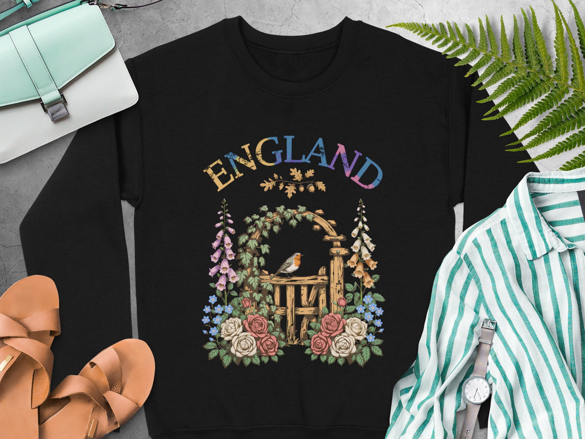 Black sweatshirt with floral garden gate design and the word ENGLAND.