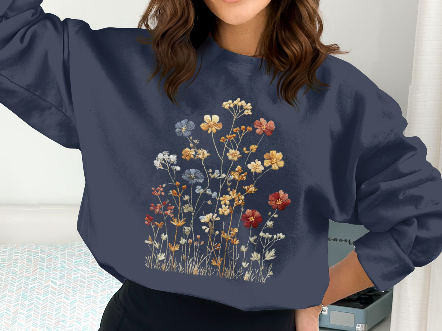 Colorful Floral Embroidered Design on Dark Blue Sweatshirt