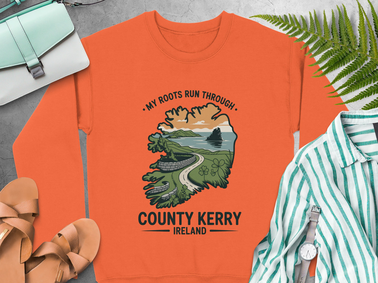 Orange sweatshirt with County Kerry Ireland graphic and text "My Roots Run Through".