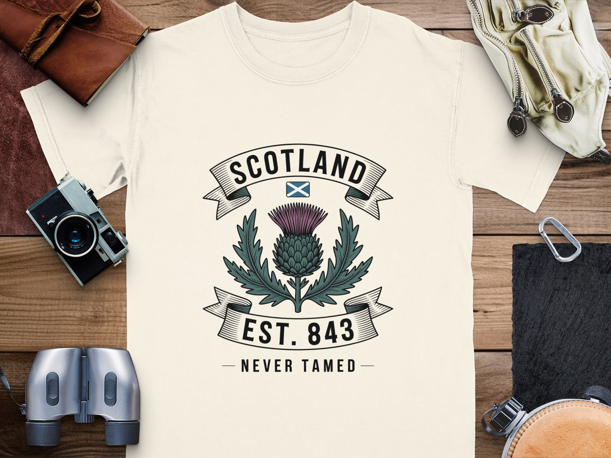 T-shirt with Scotland thistle emblem, Est. 843, Never Tamed text.