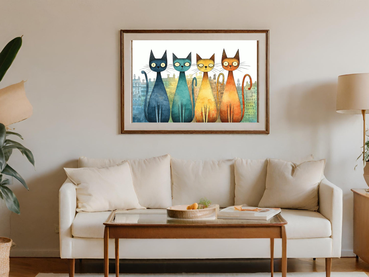 Four colorful cats in a row above a couch.